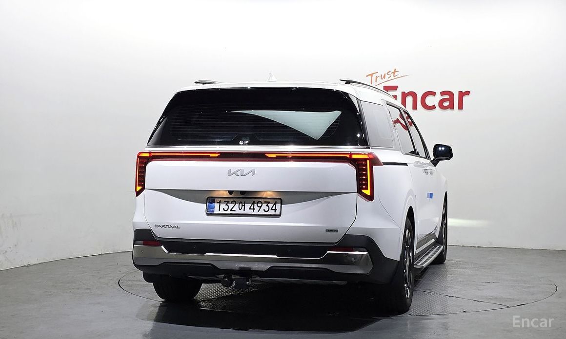 2025 Kia Carnival IV Рестайлинг HEV 9seater Signature с пробегом 13 474 км
