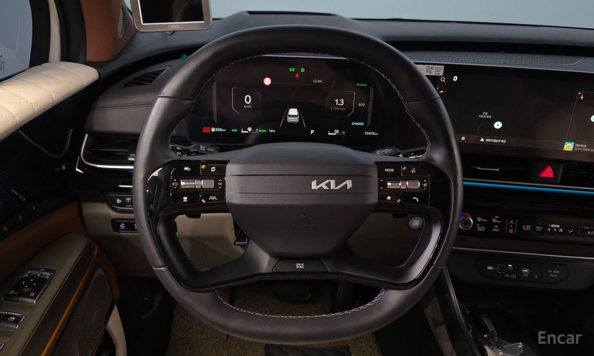 2025 Kia Carnival IV Рестайлинг HEV 9seater Signature с пробегом 13 474 км