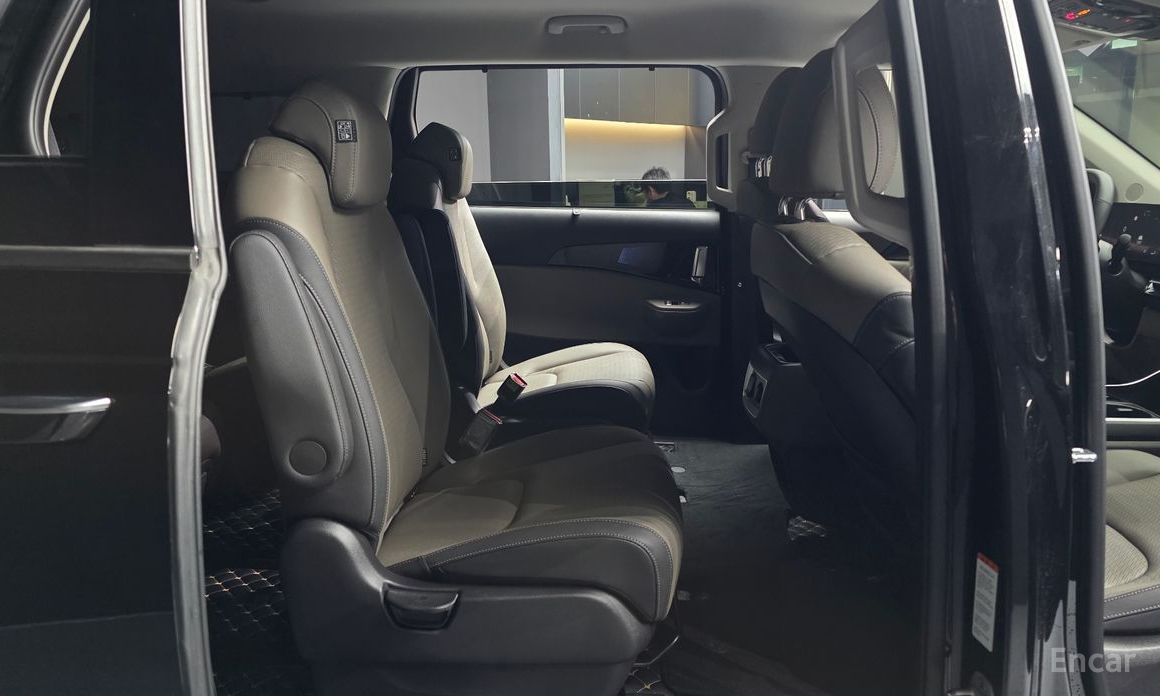 2025 Kia Carnival IV Рестайлинг HEV 9seater Signature с пробегом 15 649 км